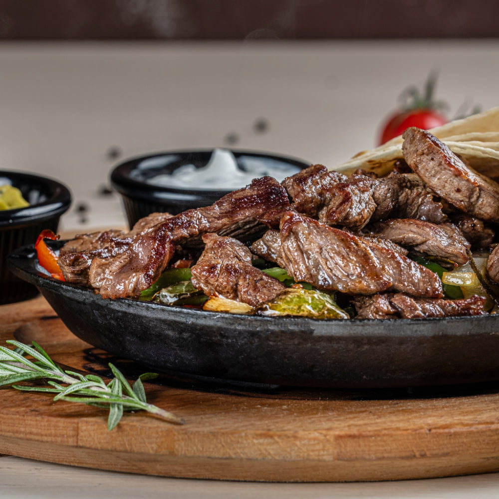 http://www.tonightwedine.com/cdn/shop/products/steakfajitas.jpg?v=1667938843